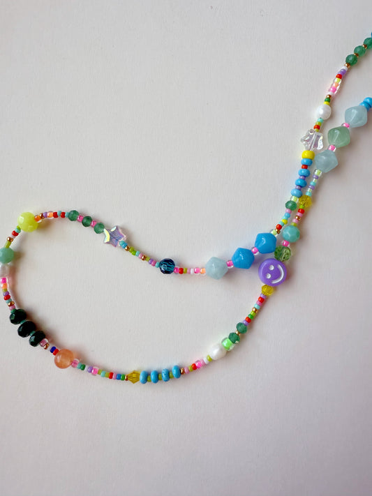 Purple Smiley face necklace